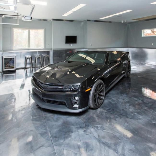 High-gloss metallic epoxy garage floor in a Miami home
